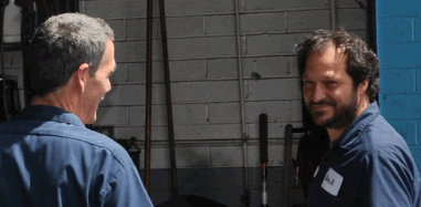 Ebers Street Garage mechanics together in the shop